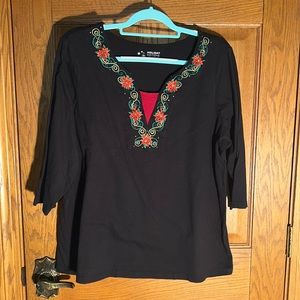 Embroidered & rhinestones embellish around neck